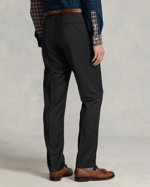 These slim flat-front trousers are crafted with Italian wool twill and feature a low-rise waist with a tapered-leg silhouette.