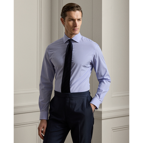 Elevating the art of shirtmaking, this distinguished essential is meticulously tailored in Italy with 140s-quality, two-ply cotton twill. The exquisite fabric is complemented by genuine mother-of-pearl buttons, reflecting Purple Label's commitment to superior crafting and timeless design.