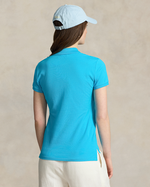 From its meticulous construction – our signature embroidered Pony requires a total of 982 individual stitches to produce – to its breathable cotton mesh fabric, Ralph Lauren Lauren's Polo shirt has been an icon of American style since 1972. This version is made with a hint of stretch for comfort.