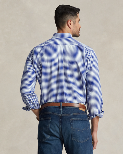 The oxford shirt made its debut very early in Ralph Lauren Lauren’s designs, and since then, it has solidified its status as a pillar of the Polo look. Our fabric is developed with a secret wash, which gives it instant character, ease and a heathered softness. The formula is so unique that it's been kept in a safe for more than three decades. In addition to details evoking its prep-school inspiration, it offers a relaxed feel, producing what we refer to as "the perfect rumple". Today, Mr Lauren continues to create countless variations of his iconic shirt, including this Big & Tall version, which is embroidered with our multicoloured signature Pony.