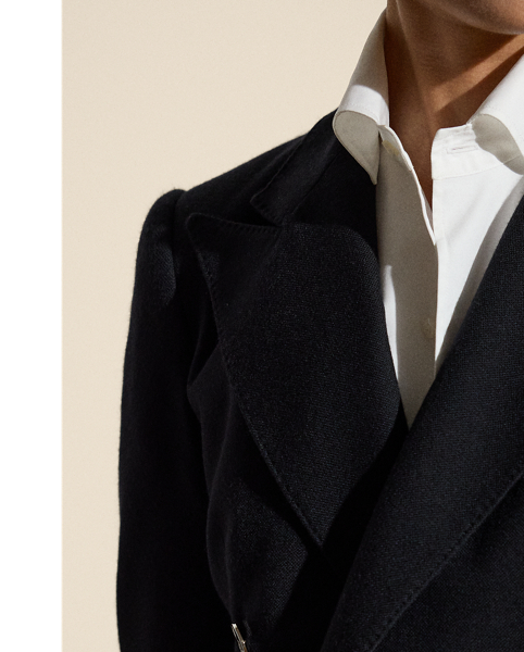 In  Ralph Lauren Lauren's hands, the iconic blazer, which made its debut as a men's sporting style in 19th-century Britain, is rendered in a traditional stretch-infused virgin wool for the ultimate in feminine elegance and modern ease.