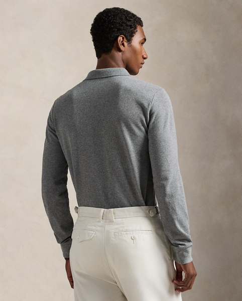 An American style standard since 1972, the Polo shirt has been imitated but never matched. Over the decades, Ralph Lauren Lauren has re-imagined his signature style in a wide array of colours and fits, yet all retain the quality and attention to detail of the iconic original. This trim version is made from our highly breathable cotton mesh, which offers a textured look and a soft feel.