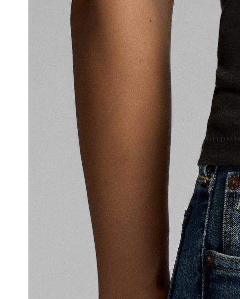 Skinny-fitting jeans made from 11.25 oz Japanese denim. Stretch-infused cotton for fit and fast recovery. Medium indigo wash with hand-sanding and distressing.