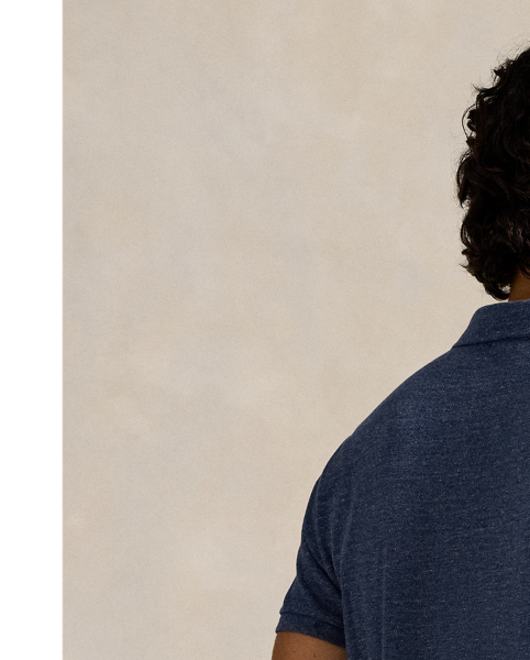An American style standard since 1972, the Polo shirt has been imitated but never matched. Over the decades,  Ralph Lauren Lauren has re-imagined his signature style in a wide array of colours and fits, yet all retain the quality and attention to detail of the iconic original. This trim version is made from our highly breathable cotton mesh, which offers a textured look and a soft feel.