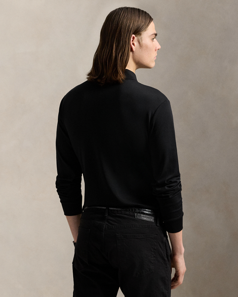An American style standard since 1972, the Polo shirt has been imitated but never matched. Over the decades, Ralph Lauren Lauren has re-imagined his signature style in a wide array of colours and fits, yet all retain the quality and attention to detail of the iconic original. This long-sleeve version is made from luxe cotton interlock with an ultra-soft finish.