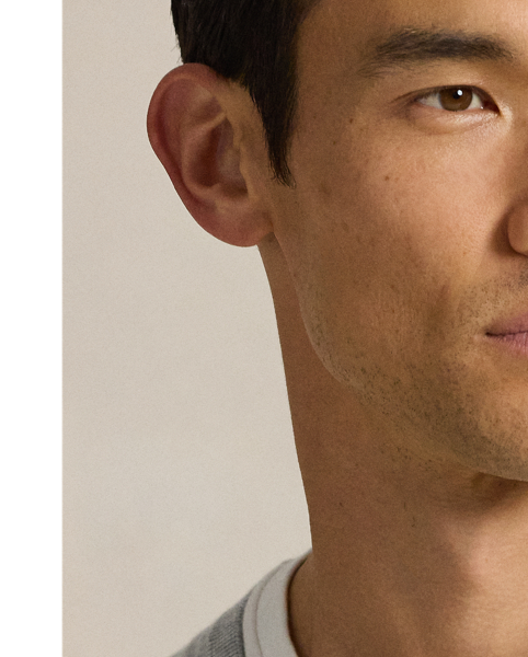 Knit from soft, breathable cotton, this lightweight sweater is a year-round layering piece.