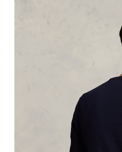 Knit from soft, breathable cotton, this lightweight sweater is a year-round layering piece.