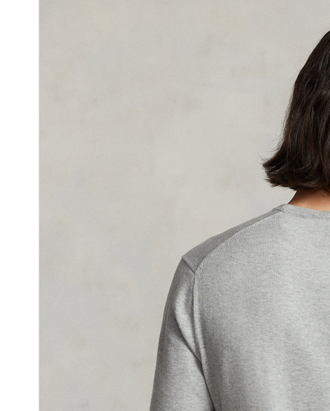 Knit from soft, breathable cotton, this lightweight sweater is a year-round layering piece.