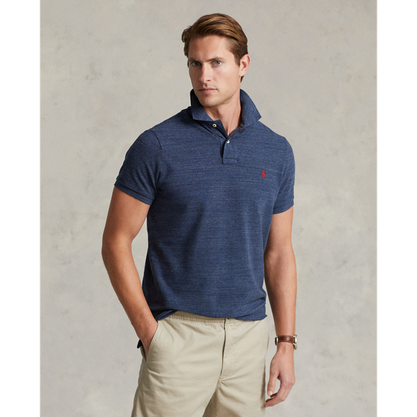 An American style standard since 1972, the Polo shirt has been imitated but never matched. Over the decades, Ralph Lauren Lauren has re-imagined his signature style in a wide array of colours and fits, yet all retain the quality and attention to detail of the iconic original. This version is cut slim through the body and washed for added softness.