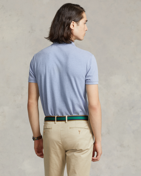 An American style standard since 1972, the Polo shirt has been imitated but never matched. Over the decades, Ralph Lauren Lauren has re-imagined his signature style in a wide array of colours and fits, yet all retain the quality and attention to detail of the iconic original. This version is cut slim through the body and washed for added softness.