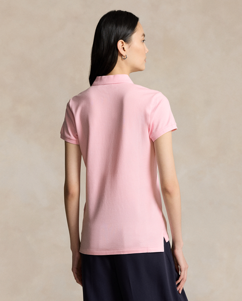 From its meticulous construction – our signature embroidered Pony requires a total of 982 individual stitches to produce – to its breathable cotton mesh fabric, Ralph Lauren Lauren's Polo shirt has been an icon of American style since 1972. This version is made with a hint of stretch for comfort.