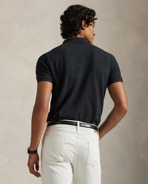 An American style standard since 1972, the Polo shirt has been imitated but never matched. Over the decades, Ralph Lauren Lauren has re-imagined his signature style in a wide array of colours and fits, yet all retain the quality and attention to detail of the iconic original. This trim version is made from our highly breathable cotton mesh, which offers a textured look and a soft feel.
