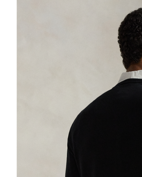 Knit from soft, breathable cotton, this lightweight sweater is a year-round layering piece.