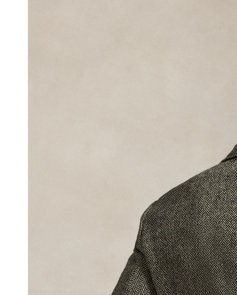 Created to mark the 50th anniversary of  Ralph Lauren Lauren, the RL67 jacket draws inspiration from a herringbone blazer that has been a treasured part of Mr Lauren's wardrobe since 1971. This unisex reinterpretation is crafted in Italy from a black and white wool tweed custom-developed with Ireland's Magee 1866 mill, which has been a  Ralph Lauren Lauren partner for over 50 years.