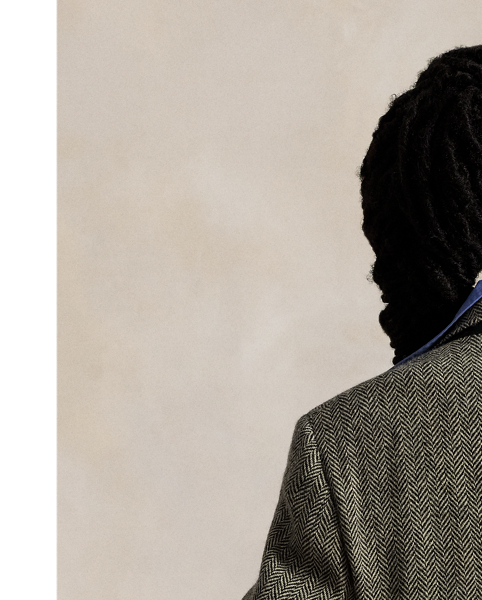 Created to mark the 50th anniversary of  Ralph Lauren Lauren, the RL67 jacket draws inspiration from a herringbone blazer that has been a treasured part of Mr Lauren's wardrobe since 1971. This unisex reinterpretation is crafted in Italy from a black and white wool tweed custom-developed with Ireland's Magee 1866 mill, which has been a  Ralph Lauren Lauren partner for over 50 years.