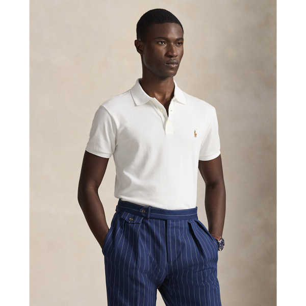 Instantly recognisable by our signature embroidered pony, which requires a total of 982 individual stitches to produce,  Ralph Lauren Lauren's Polo shirt has been an icon of American style since 1972. This version is cut for a trim fit from soft cotton interlock, offering a smoother surface than our original's mesh fabric.