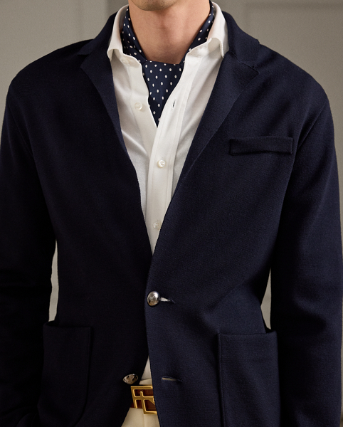 Masterfully crafted in Italy, this lightweight layer exemplifies Purple Label's artistry by seamlessly uniting the sophistication of a notch-lapel blazer with the comfort of a fine-knit cardigan. The distinguished design is elevated by our signature metal buttons, reflecting our commitment to creating garments of enduring elegance.