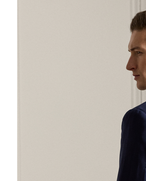 The double-breasted blazer is a staple of Mr Lauren's personal wardrobe, and this Purple Label version pays homage to the iconic silhouette. Immaculately tailored by hand in Italy with custom-developed wool serge, this blazer is defined by meticulously shaped shoulders that offer a raised, roped profile at the seam.