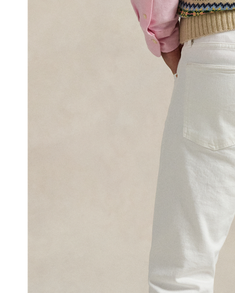 The slim-leg Sullivan features a regular rise and a trim fit through the seat, thigh and knee. This pair is made from stretch denim and treated to achieve a clean white hue.