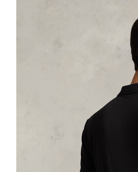An American style standard since 1972, the Polo shirt has been imitated but never matched. Over the decades,  Ralph Lauren Lauren has re-imagined his signature style in a wide array of colours and fits, yet all retain the quality and attention to detail of the iconic original. This trim version is made from luxe cotton interlock with an ultra-soft finish.