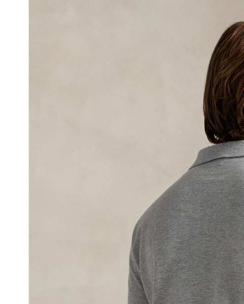 An American style standard since 1972, the Polo shirt has been imitated but never matched. Over the decades,  Ralph Lauren Lauren has re-imagined his signature style in a wide array of colours and fits, yet all retain the quality and attention to detail of the iconic original. This trim version is made from our highly breathable cotton mesh, which offers a textured look and a soft feel.