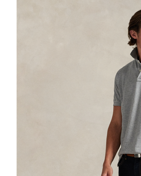 An American style standard since 1972, the Polo shirt has been imitated but never matched. Over the decades,  Ralph Lauren Lauren has re-imagined his signature style in a wide array of colours and fits, yet all retain the quality and attention to detail of the iconic original. This trim version is made from our highly breathable cotton mesh, which offers a textured look and a soft feel.