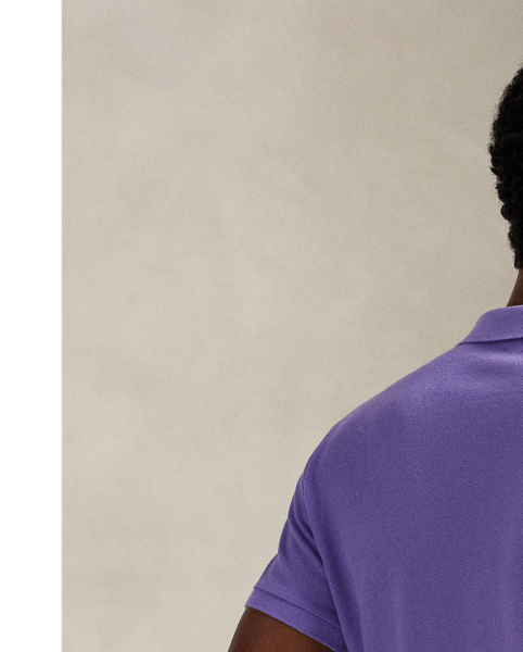 An American style standard since 1972, the Polo shirt has been imitated but never matched. Over the decades,  Ralph Lauren Lauren has re-imagined his signature style in a wide array of colours and fits, yet all retain the quality and attention to detail of the iconic original. This trim version is made from our highly breathable cotton mesh, which offers a textured look and a soft feel.