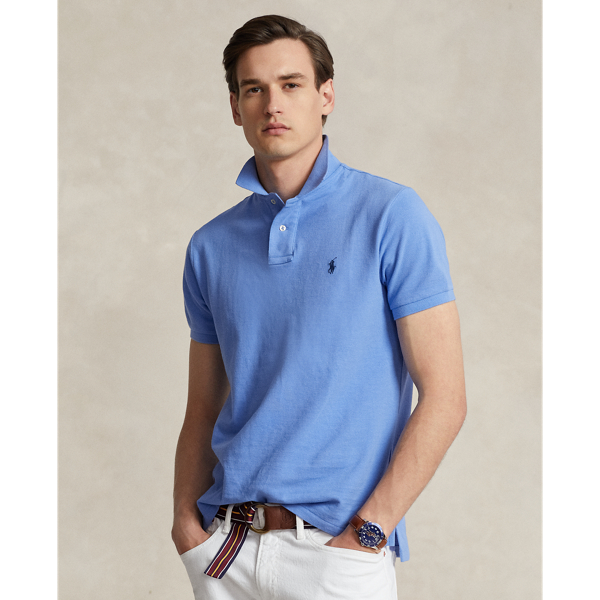 An American style standard since 1972, the Polo shirt has been imitated but never matched. Over the decades,  Ralph Lauren Lauren has re-imagined his signature style in a wide array of colours and fits, yet all retain the quality and attention to detail of the iconic original. This trim version is made from our highly breathable cotton mesh, which offers a textured look and a soft feel.