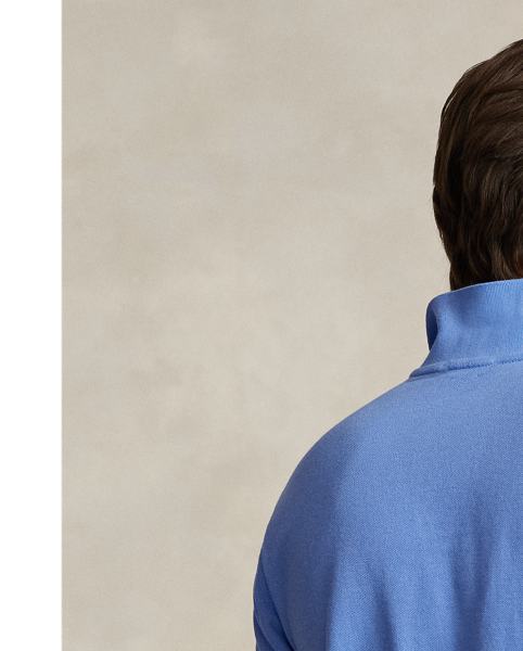 An American style standard since 1972, the Polo shirt has been imitated but never matched. Over the decades,  Ralph Lauren Lauren has re-imagined his signature style in a wide array of colours and fits, yet all retain the quality and attention to detail of the iconic original. This trim version is made from our highly breathable cotton mesh, which offers a textured look and a soft feel.