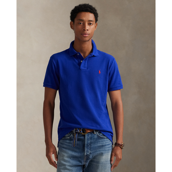 An American style standard since 1972, the Polo shirt has been imitated but never matched. Over the decades, Ralph Lauren Lauren has re-imagined his signature style in a wide array of colours and fits, yet all retain the quality and attention to detail of the iconic original. This trim version is made from our highly breathable cotton mesh, which offers a textured look and a soft feel.