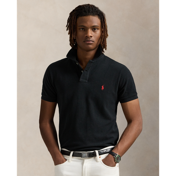 An American style standard since 1972, the Polo shirt has been imitated but never matched. Over the decades, Ralph Lauren Lauren has re-imagined his signature style in a wide array of colours and fits, yet all retain the quality and attention to detail of the iconic original. This trim version is made from our highly breathable cotton mesh, which offers a textured look and a soft feel.