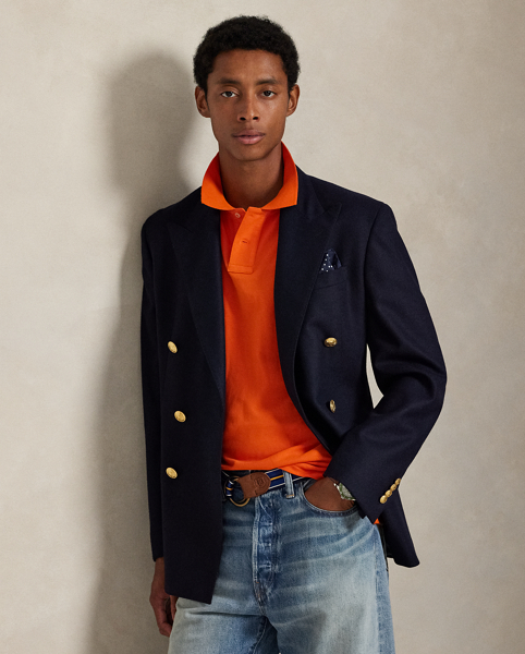 An American style standard since 1972, the Polo shirt has been imitated but never matched. Over the decades, Ralph Lauren Lauren has re-imagined his signature style in a wide array of colours and fits, yet all retain the quality and attention to detail of the iconic original. This trim version is made from our highly breathable cotton mesh, which offers a textured look and a soft feel.