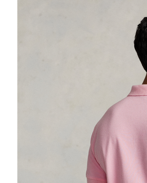 An American style standard since 1972, the Polo shirt has been imitated but never matched. Over the decades,  Ralph Lauren Lauren has re-imagined his signature style in a wide array of colours and fits, yet all retain the quality and attention to detail of the iconic original. This trim version is made from our highly breathable cotton mesh, which offers a textured look and a soft feel.