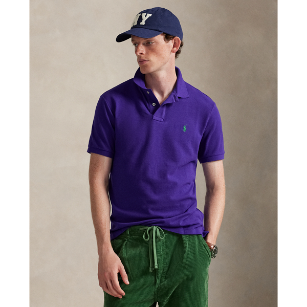 An American style standard since 1972, the Polo shirt has been imitated but never matched. Over the decades, Ralph Lauren Lauren has re-imagined his signature style in a wide array of colours and fits, yet all retain the quality and attention to detail of the iconic original. This trim version is made from our highly breathable cotton mesh, which offers a textured look and a soft feel.