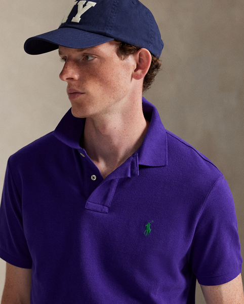 An American style standard since 1972, the Polo shirt has been imitated but never matched. Over the decades, Ralph Lauren Lauren has re-imagined his signature style in a wide array of colours and fits, yet all retain the quality and attention to detail of the iconic original. This trim version is made from our highly breathable cotton mesh, which offers a textured look and a soft feel.