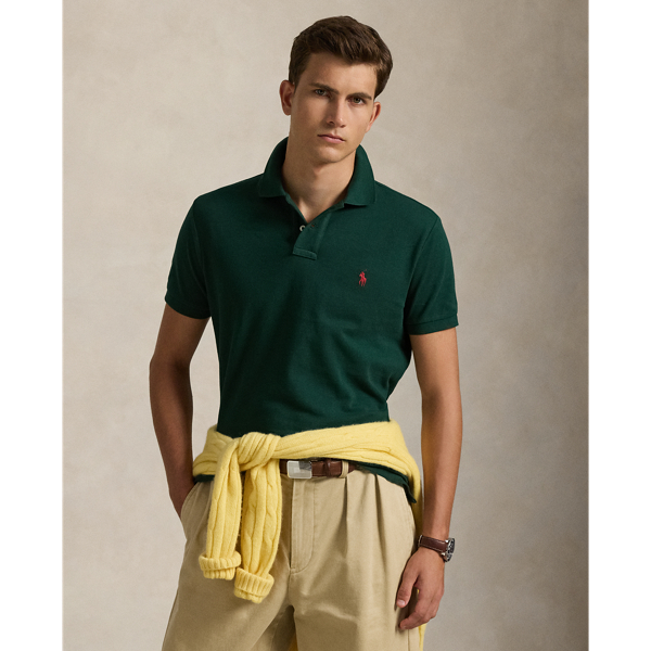 An American style standard since 1972, the Polo shirt has been imitated but never matched. Over the decades,  Ralph Lauren Lauren has re-imagined his signature style in a wide array of colours and fits, yet all retain the quality and attention to detail of the iconic original. This trim version is made from our highly breathable cotton mesh, which offers a textured look and a soft feel.