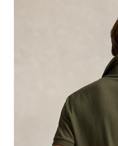 An American style standard since 1972, the Polo shirt has been imitated but never matched. Over the decades,  Ralph Lauren Lauren has re-imagined his signature style in a wide array of colours and fits, yet all retain the quality and attention to detail of the iconic original. This trim version is made from our highly breathable cotton mesh, which offers a textured look and a soft feel.