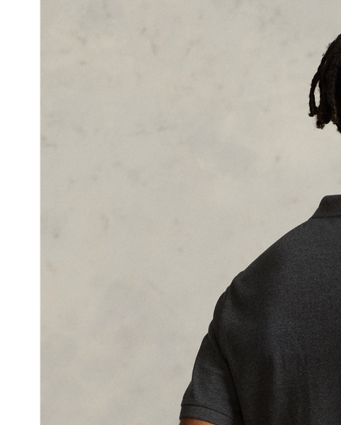 An American style standard since 1972, the Polo shirt has been imitated but never matched. Over the decades,  Ralph Lauren Lauren has re-imagined his signature style in a wide array of colours and fits, yet all retain the quality and attention to detail of the iconic original. This trim version is made from our highly breathable cotton mesh, which offers a textured look and a soft feel.