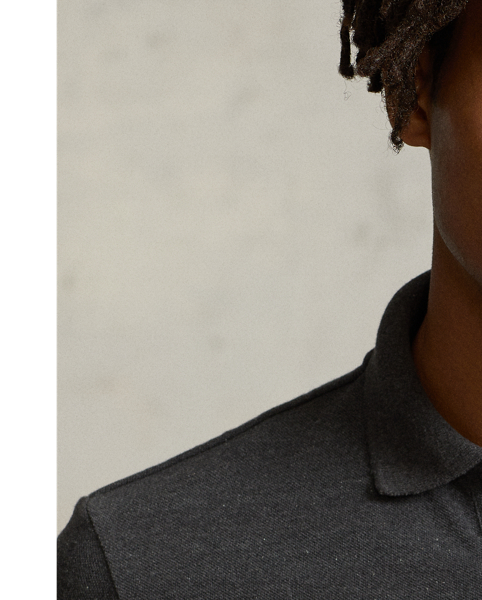 An American style standard since 1972, the Polo shirt has been imitated but never matched. Over the decades,  Ralph Lauren Lauren has re-imagined his signature style in a wide array of colours and fits, yet all retain the quality and attention to detail of the iconic original. This trim version is made from our highly breathable cotton mesh, which offers a textured look and a soft feel.