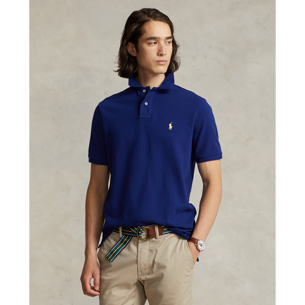 An American style standard since 1972, the Polo shirt has been imitated but never matched. Over the decades, Ralph Lauren Lauren has re-imagined his signature style in a wide array of colours and fits, yet all retain the quality and attention to detail of the iconic original. This trim version is made from our highly breathable cotton mesh, which offers a textured look and a soft feel.