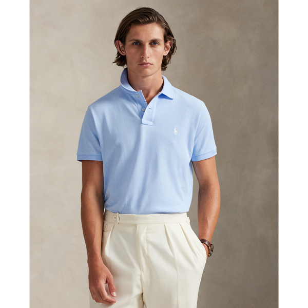 An American style standard since 1972, the Polo shirt has been imitated but never matched. Over the decades,  Ralph Lauren Lauren has re-imagined his signature style in a wide array of colours and fits, yet all retain the quality and attention to detail of the iconic original. This trim version is made from our highly breathable cotton mesh, which offers a textured look and a soft feel.