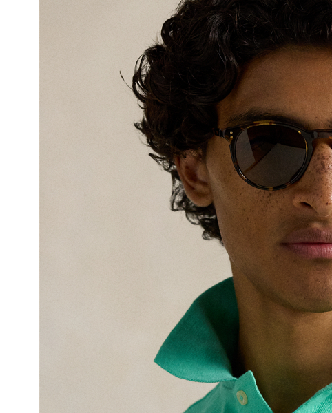 An American style standard since 1972, the Polo shirt has been imitated but never matched. Over the decades,  Ralph Lauren Lauren has re-imagined his signature style in a wide array of colours and fits, yet all retain the quality and attention to detail of the iconic original. This trim version is made from our highly breathable cotton mesh, which offers a textured look and a soft feel.