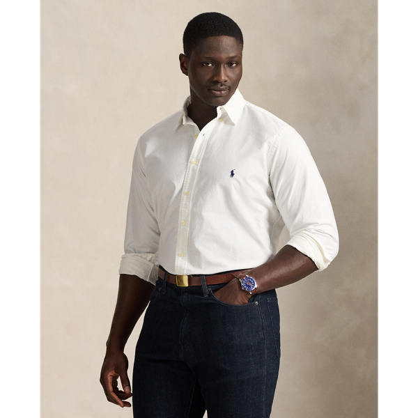 The oxford shirt made its debut very early in  Ralph Lauren Lauren’s designs, and since then, it has solidified its status as a pillar of the Polo look. Our fabric is developed with a secret wash, which gives it instant character, ease and a heathered softness. The formula is so unique that it's been kept in a safe for more than three decades. In addition to details evoking its prep-school inspiration, it offers a relaxed feel, producing what we refer to as "the perfect rumple". Today, Mr Lauren continues to create countless variations of his iconic shirt, including this Big & Tall version, which is garment-dyed and finished with our signature embroidered Pony.