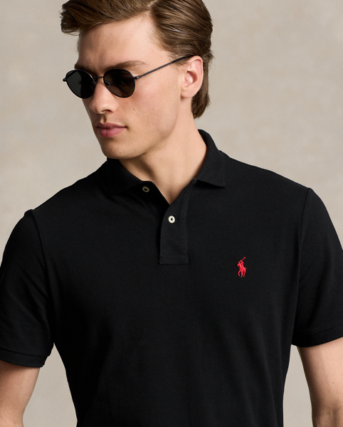 An American style standard since 1972, the Polo shirt has been imitated but never matched. Over the decades, Ralph Lauren Lauren has re-imagined his signature style in a wide array of colours and fits, yet all retain the quality and attention to detail of the iconic original. This relaxed version is made from our highly breathable cotton mesh, which offers a textured look and a soft feel.