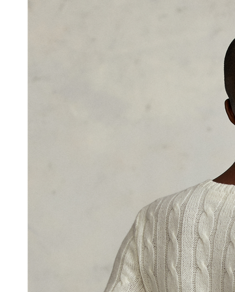 Inspired by fishermen's ropes, the cable-knit jumper's defining motif has transformed from a practical, hard-wearing construction into a symbol of collegiate style. This version is crafted from luxuriously soft cashmere, which is spun and dyed in a renowned Italian mill.