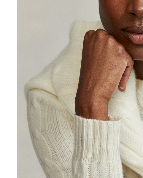 Inspired by fishermen's ropes, the cable-knit jumper's defining motif has transformed from a practical, hard-wearing construction into a symbol of collegiate style. This version is crafted from luxuriously soft cashmere, which is spun and dyed in a renowned Italian mill.