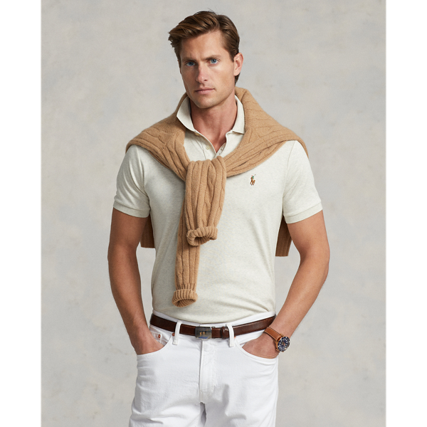 An American style standard since 1972, the Polo shirt has been imitated but never matched. Over the decades, Ralph Lauren Lauren has re-imagined his signature style in a wide array of colours and fits, yet all retain the quality and attention to detail of the iconic original. This trim version is made from luxe cotton interlock with an ultra-soft finish.