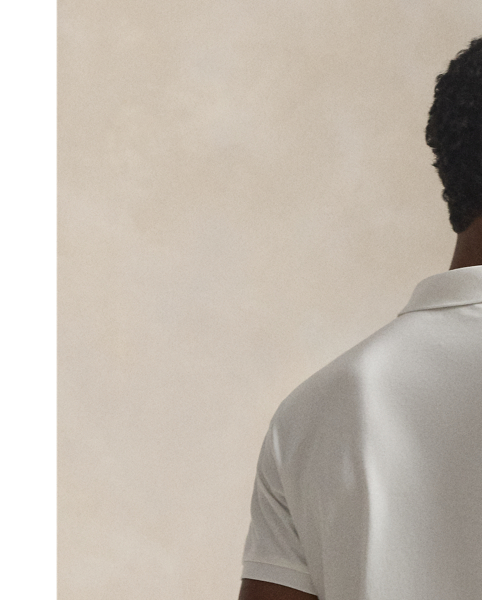 An American style standard since 1972, the Polo shirt has been imitated but never matched. Over the decades,  Ralph Lauren Lauren has re-imagined his signature style in a wide array of colours and fits, yet all retain the quality and attention to detail of the iconic original. This trim version is made from luxe cotton interlock with an ultra-soft finish.