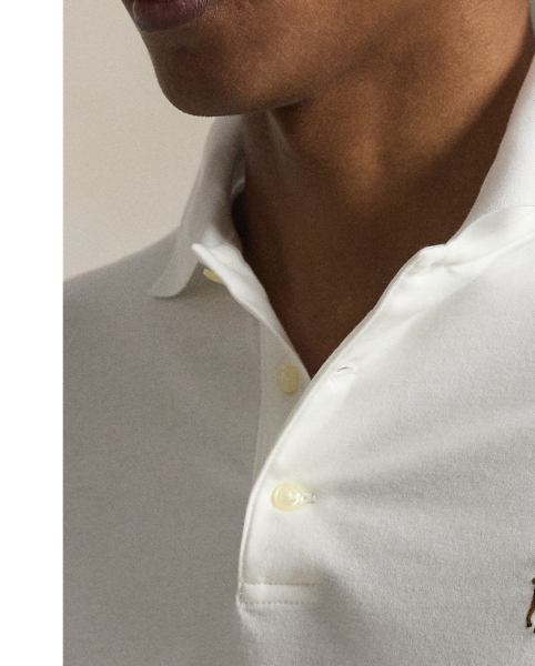 An American style standard since 1972, the Polo shirt has been imitated but never matched. Over the decades,  Ralph Lauren Lauren has re-imagined his signature style in a wide array of colours and fits, yet all retain the quality and attention to detail of the iconic original. This trim version is made from luxe cotton interlock with an ultra-soft finish.