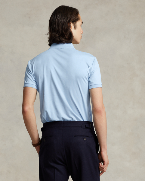 An American style standard since 1972, the Polo shirt has been imitated but never matched. Over the decades, Ralph Lauren Lauren has re-imagined his signature style in a wide array of colours and fits, yet all retain the quality and attention to detail of the iconic original. This trim version is made from luxe cotton interlock with an ultra-soft finish.
